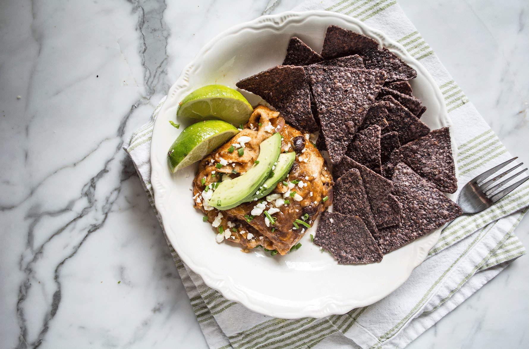 Healthy Pumpkin Black Bean Enchilada Casserole | Lemons and Basil